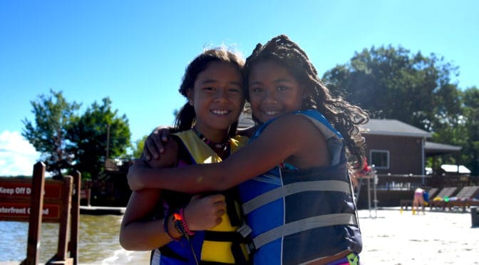 International campers enjoying summer camp activities together