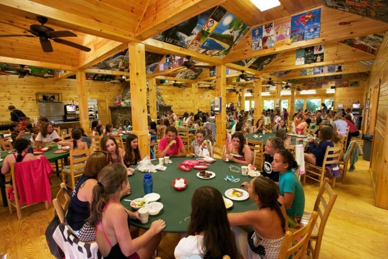 Campers eating together in a camp dining hall