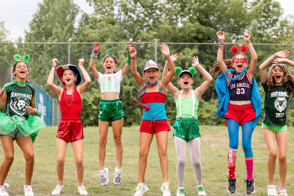 Girls showing their summer camp spirit