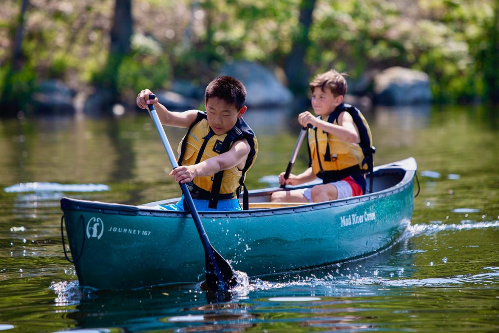 canoeing is one of camp pemi's activities